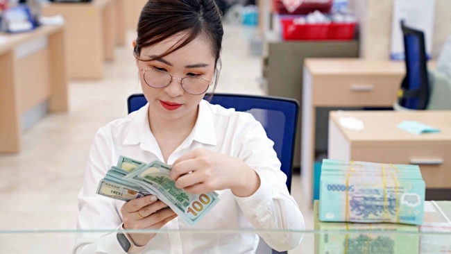 Tỷ giá tạm hạ nhiệt nhưng còn nhiều ẩn số phía trước