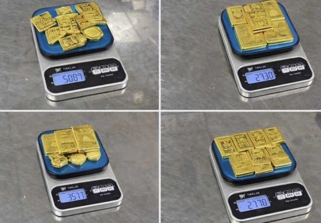 bat giu 4 hanh khach giau 123 kg kim loai nghi la vang mieng tai san bay noi bai